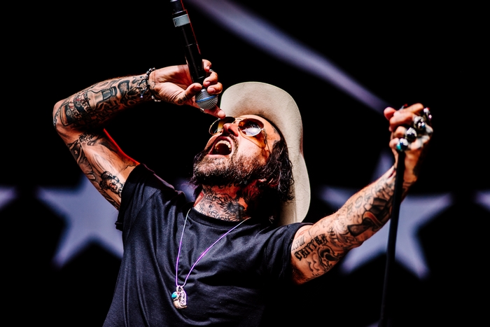 Yelawolf, tattooed American rapper, performing live