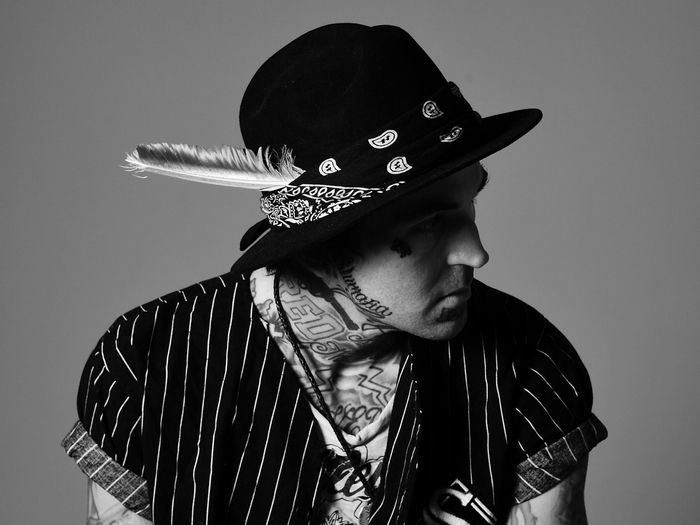 Yelawolf Black and White Rapper Portrait with Hat and Feather