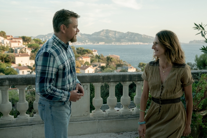 Matt Damon and Camille Cottin in Stillwater with coastal view