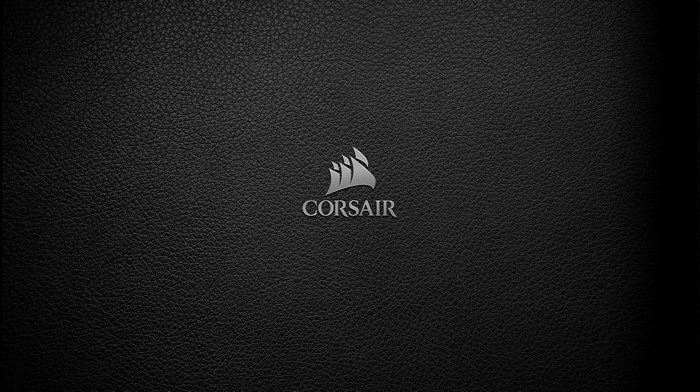Silver Corsair logo on black leather 4K