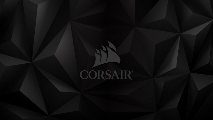Corsair logo on black geometric pattern