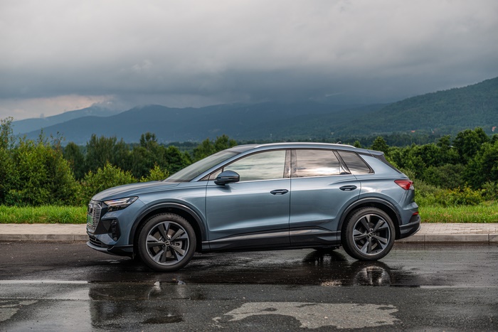 Audi Q4 E-tron electric SUV with mountain view