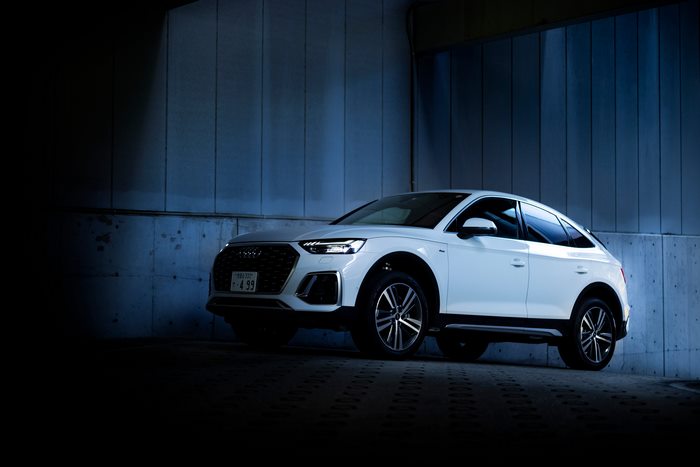 White Audi Q5 Sportback in a dimly lit garage