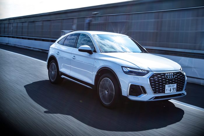 White Audi Q5 Sportback driving on a highway