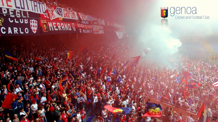 Genoa C.F.C. soccer fans with red smoke in stadium