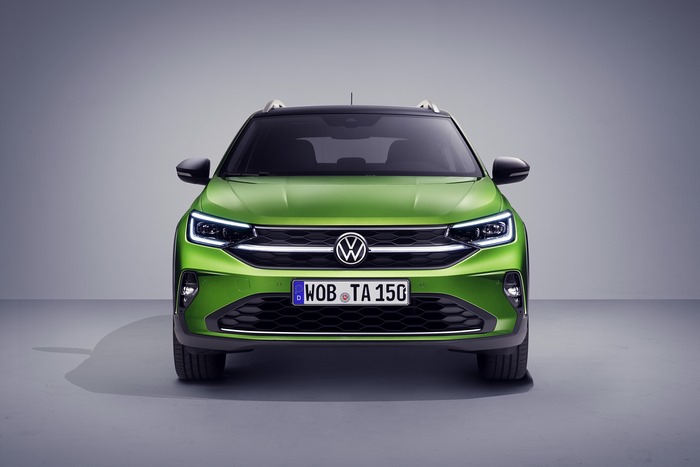 Green Volkswagen Taigo SUV in 4K