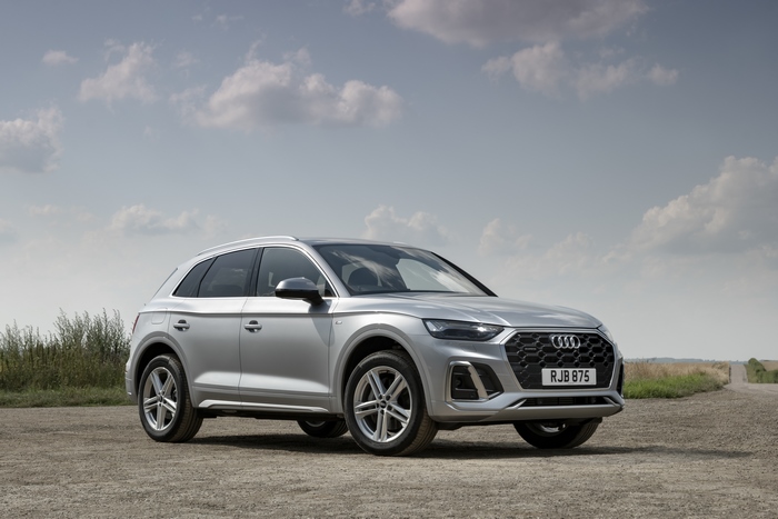 Silver 2021 Audi Q4 e-tron S line SUV on dirt road