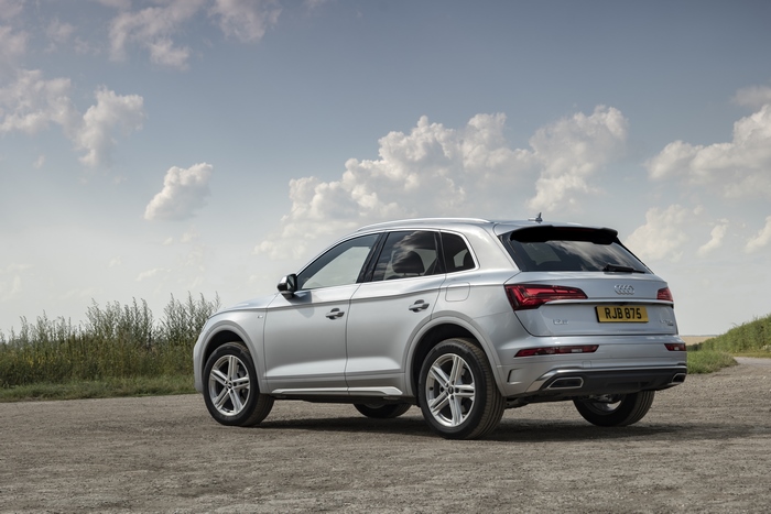 Silver Audi Q5 SUV parked on a dirt road