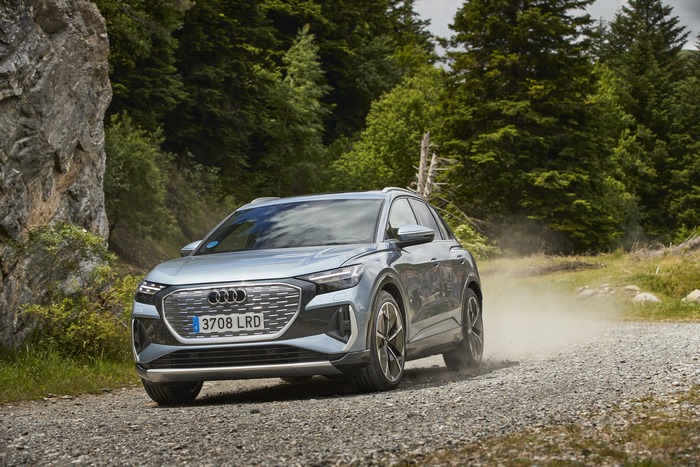 Audi Q4 e-tron electric SUV on dusty gravel road