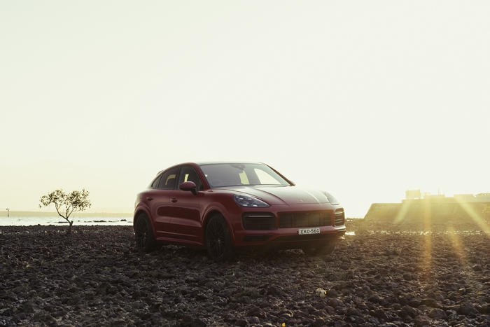 Red Porsche Cayenne GTS Coupé at Golden Hour