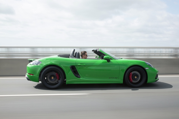 Green Porsche 718 Boxster GTS 4.0 Sport Car on Road