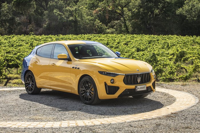 Yellow and Blue Maserati Levante GT Hybrid Fuoriserie SUV in Vineyard