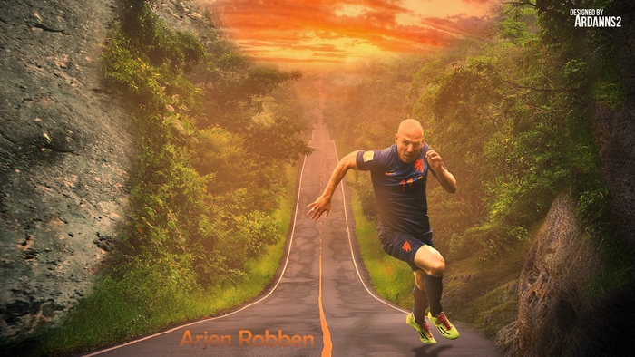Arjen Robben running uphill on a forest road at sunset