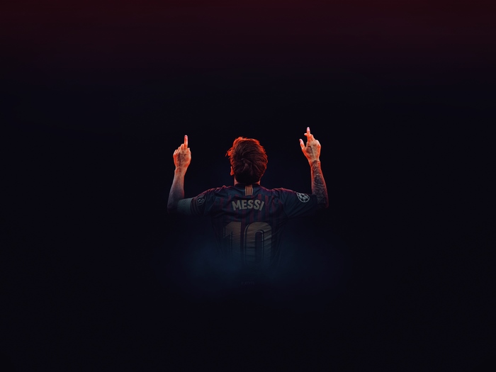 FC Barcelona's Messi celebrating, pointing to the sky