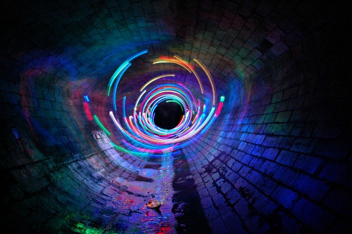 Artistic Neon Light Vortex in a Dark Tunnel