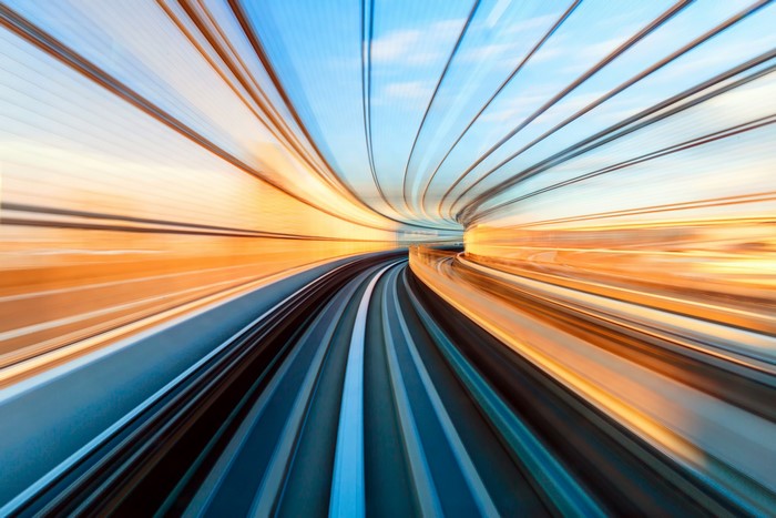 High-speed tunnel with vibrant light streaks