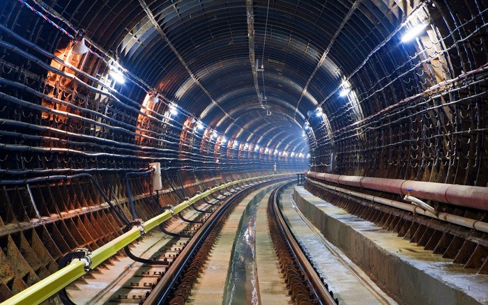 Illuminated Curved Underground Railroad Tunnel
