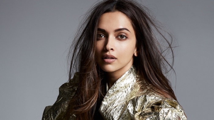 Deepika Padukone in metallic gold jacket