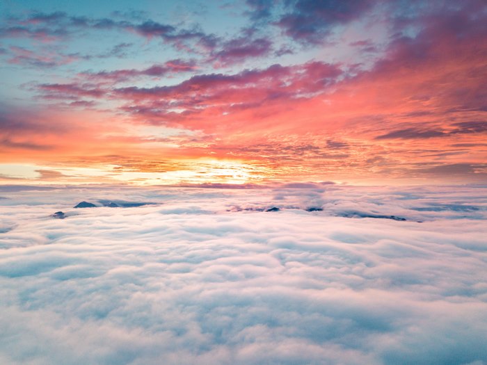 Vibrant Sunrise Sky Above the Clouds