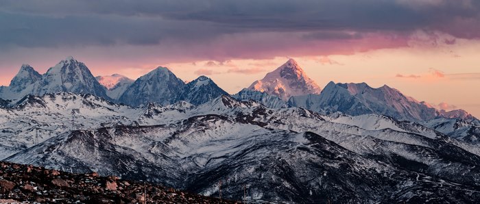 Alpenglow on Snowy Mountain Peaks 4K