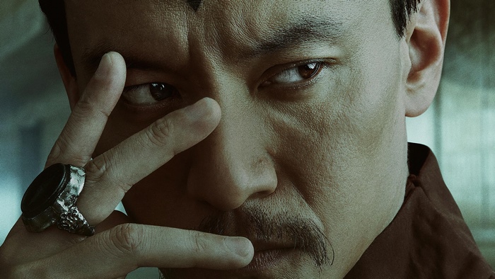 Chen Chang as Dr Wellington Yueh with intense gaze