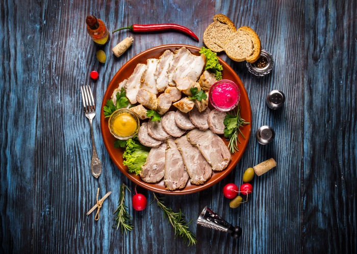 Still Life of Assorted Sliced Meats and Condiments