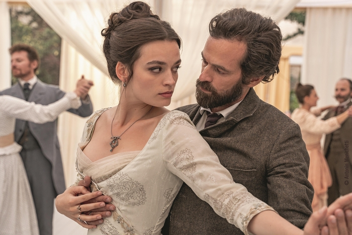 Emma Mackey and Romain Duris dancing