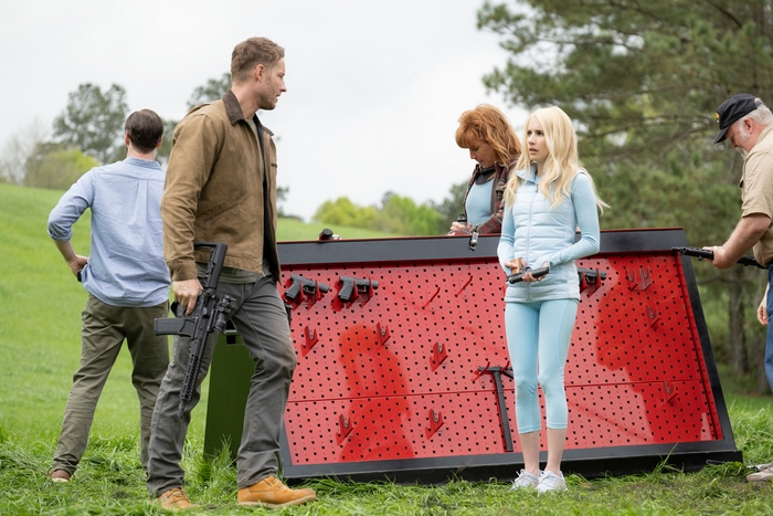 The Hunt (2020) Justin Hartley and Emma Roberts with firearms