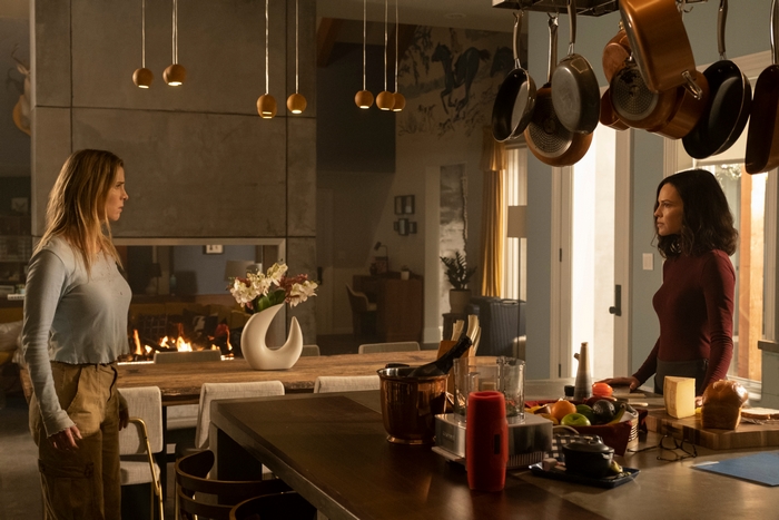 Betty Gilpin and Hilary Swank in The Hunt (2020)