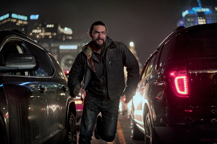 Jason Momoa running between cars in Sweet Girl