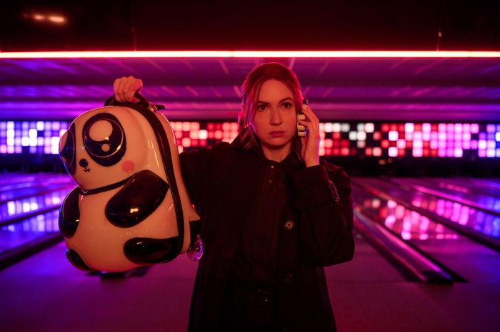 Karen Gillan with panda bowling ball in Gunpowder Milkshake