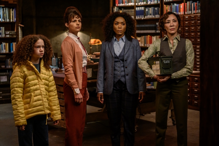 Gunpowder Milkshake: Four women in a library