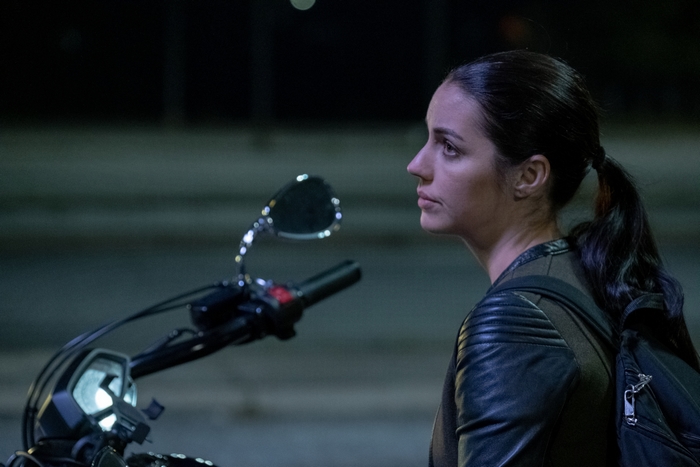Eva de Dominici on motorcycle in Cosmic Sin