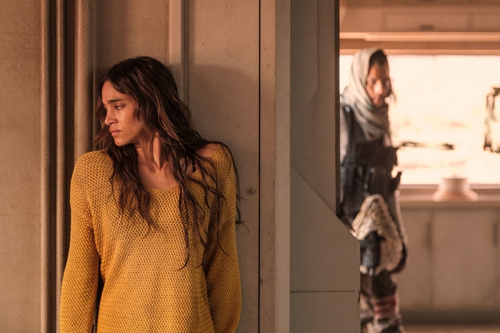 Sofia Boutella in Settlers looking contemplative