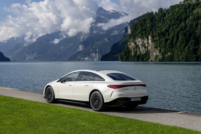 Luxury Electric Mercedes-Benz EQS 580 by mountain lake