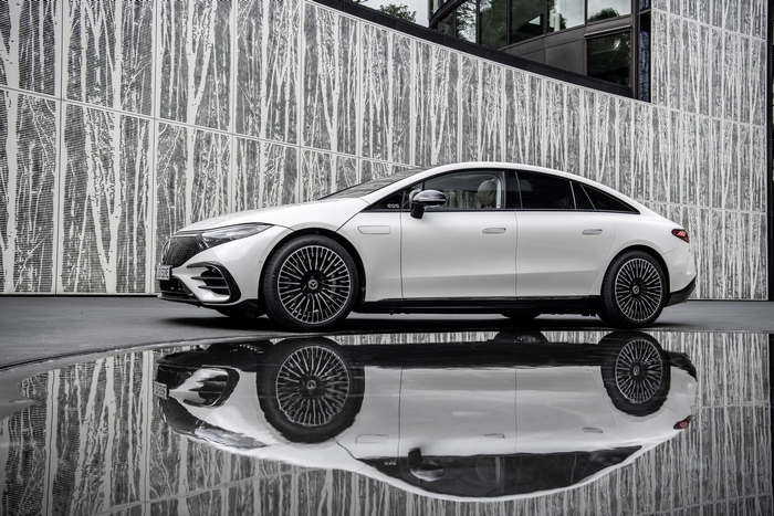 White Mercedes-Benz EQS 580 4MATIC Electric Car with Reflection
