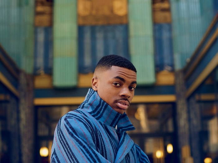 Vince Staples in a blue striped jacket