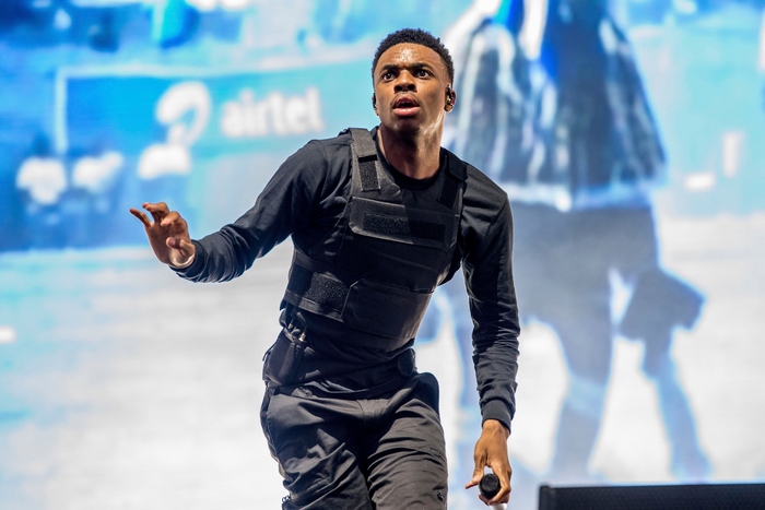 Vince Staples performing live in tactical vest