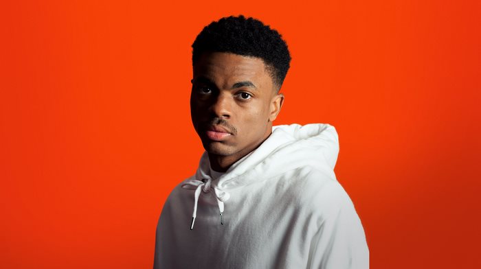 Portrait of Vince Staples in white hoodie