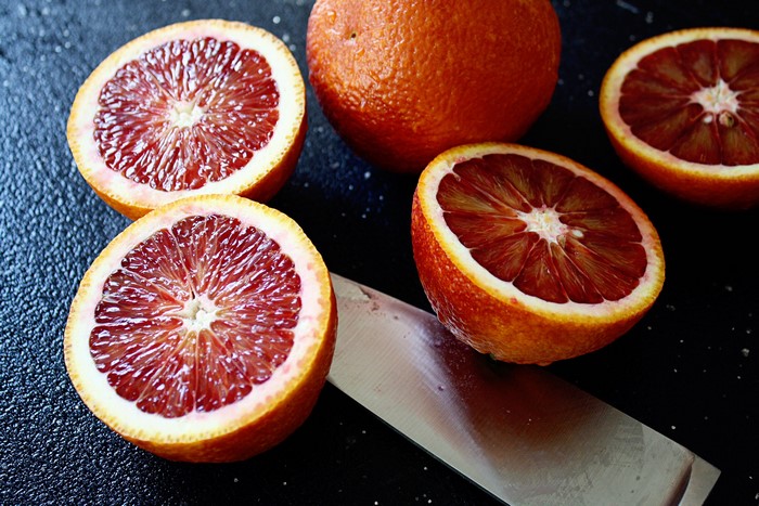 Sliced and Whole Blood Oranges