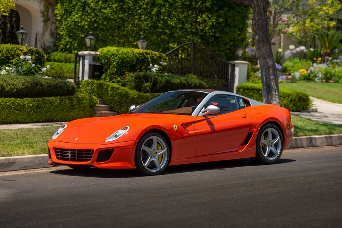 Orange Ferrari Supercar Parked on Street