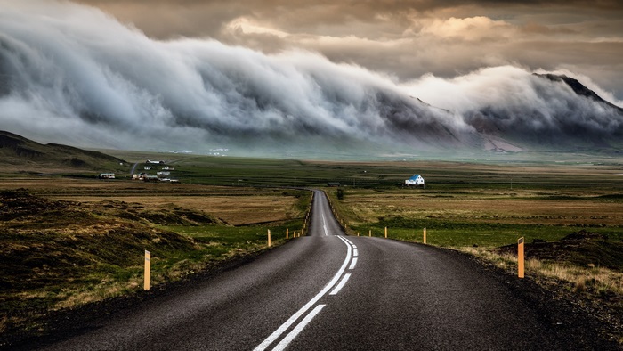 Dramatic Road through Foggy Mountains