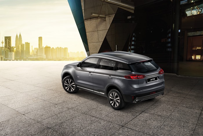 Proton X70 SUV with Kuala Lumpur city skyline