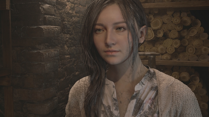 Mia Winters looking pensive in a rustic room