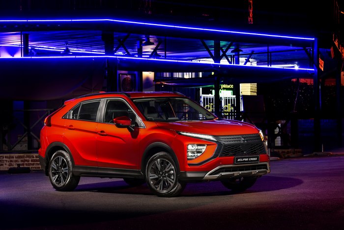 Mitsubishi Eclipse Cross SUV at night with blue lights 4K