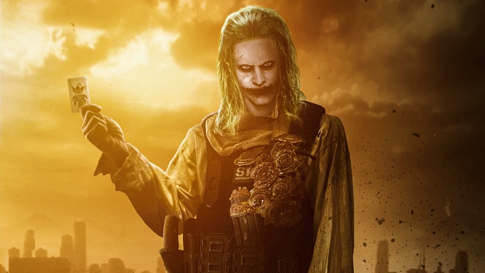 Jared Leto Knightmare Joker holding playing card