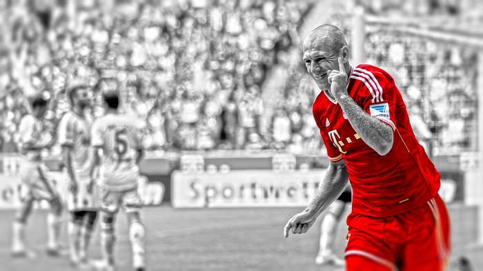 Arjen Robben celebrates in FC Bayern Munich kit