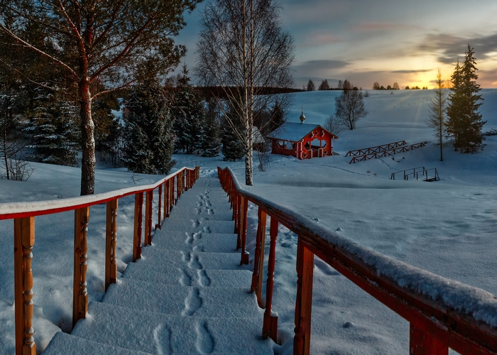 Red Cabin and Snowy Stairs in Winter