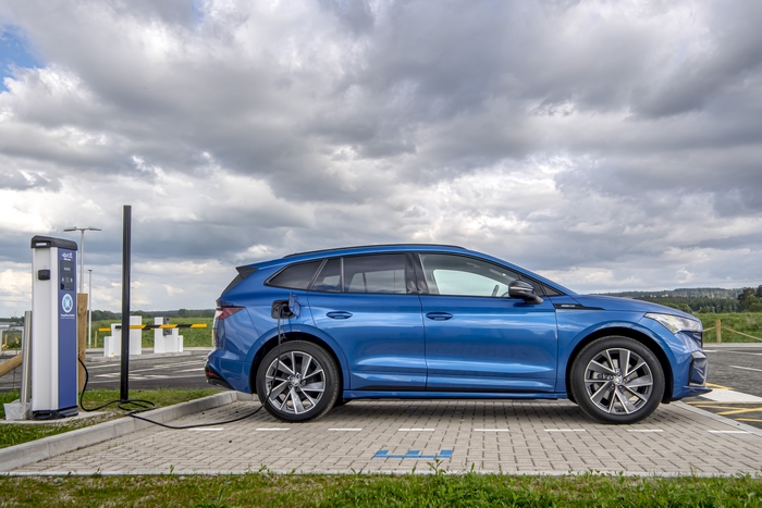 Blue Škoda Enyaq Sportline iV 80 electric SUV charging