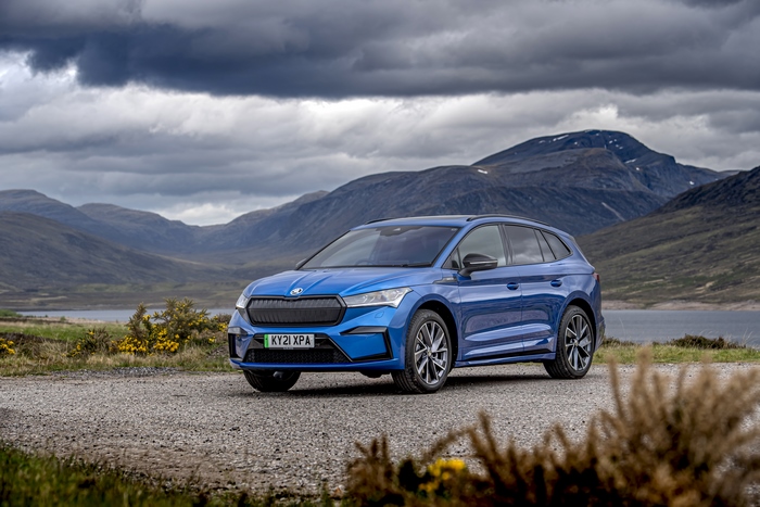 Blue Škoda Enyaq Sportline iV 80 SUV in mountains